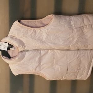 Jacket for holders girls or younger women is reversible